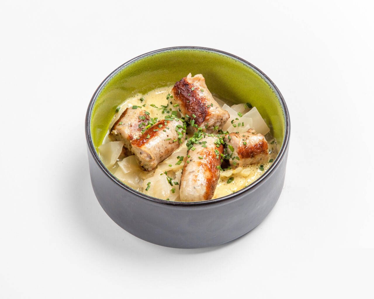 Hopfenbratenwurst vom Strohschwein, Schilcherkraut und Senfschaum